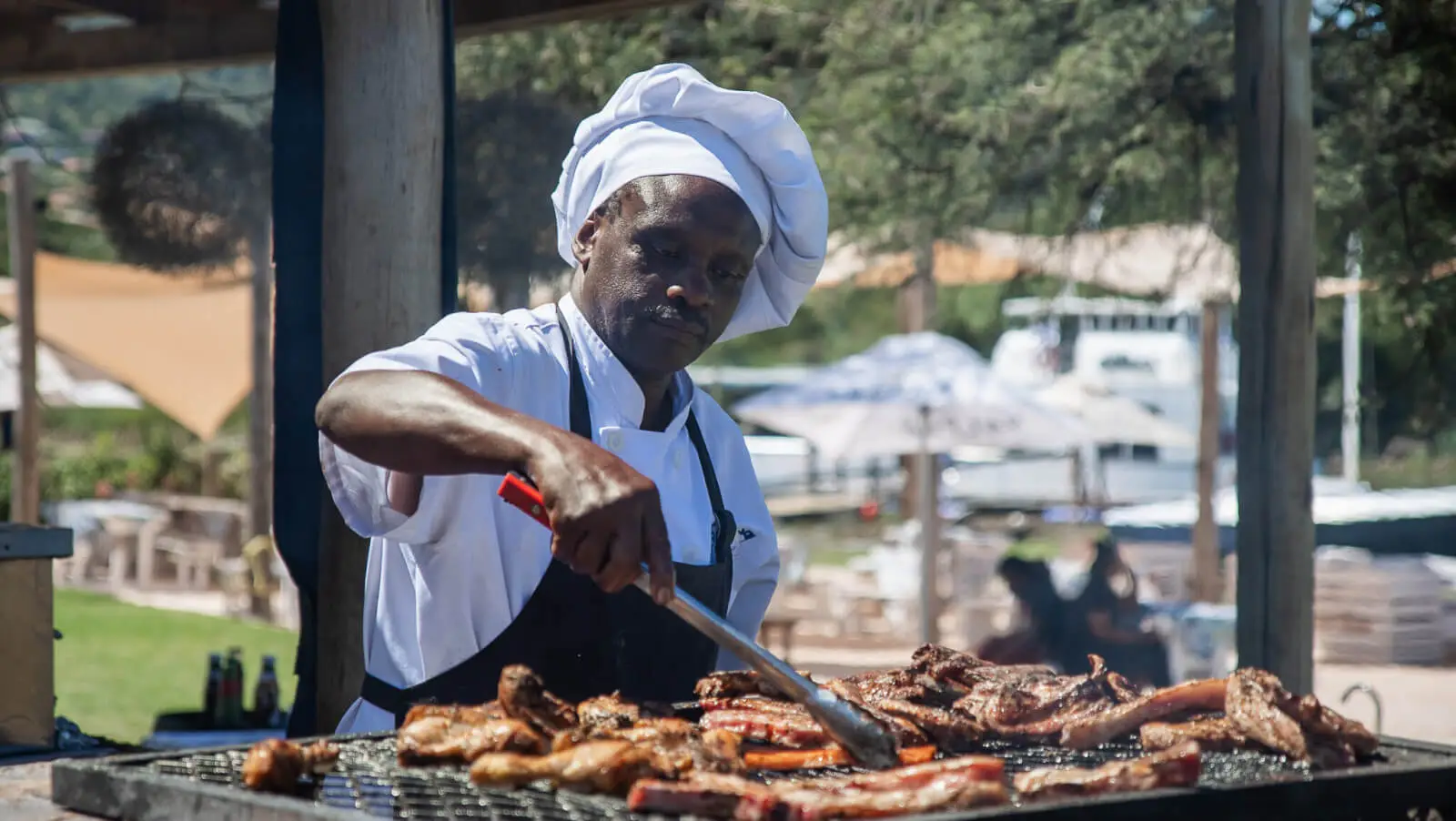 A chef at the shisanyama grill