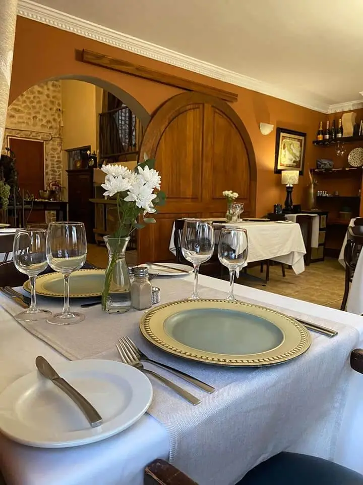 The dining room set for dinner