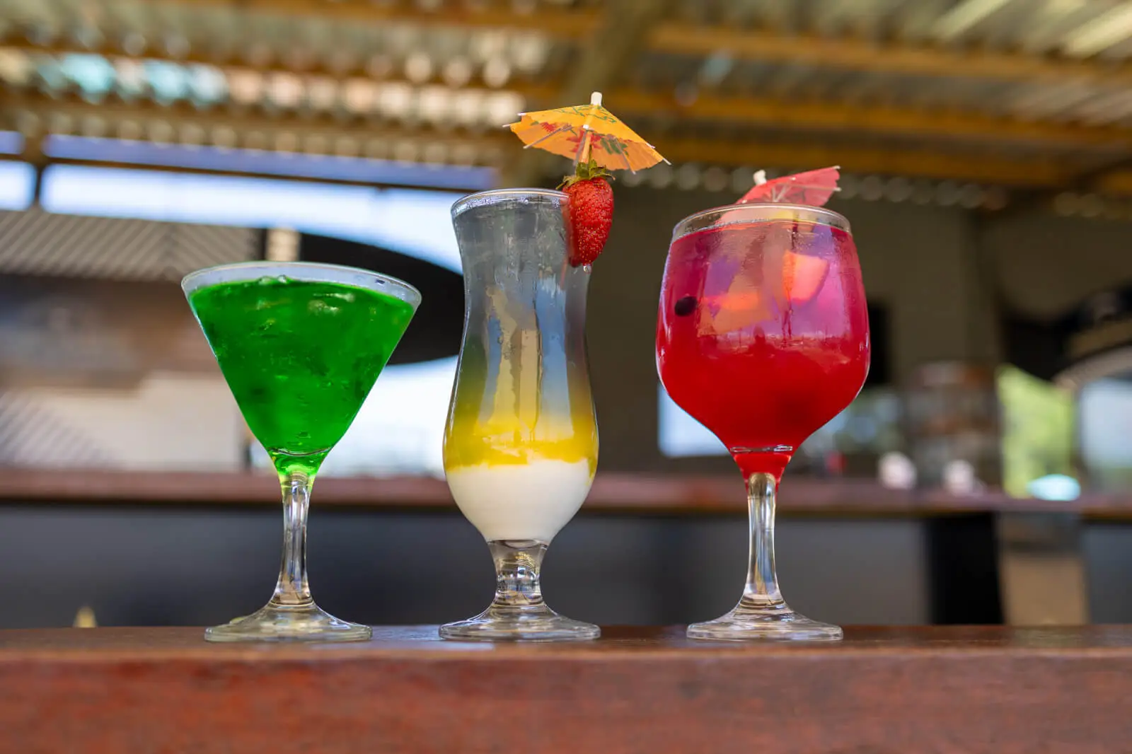 Three cocktails on the bar