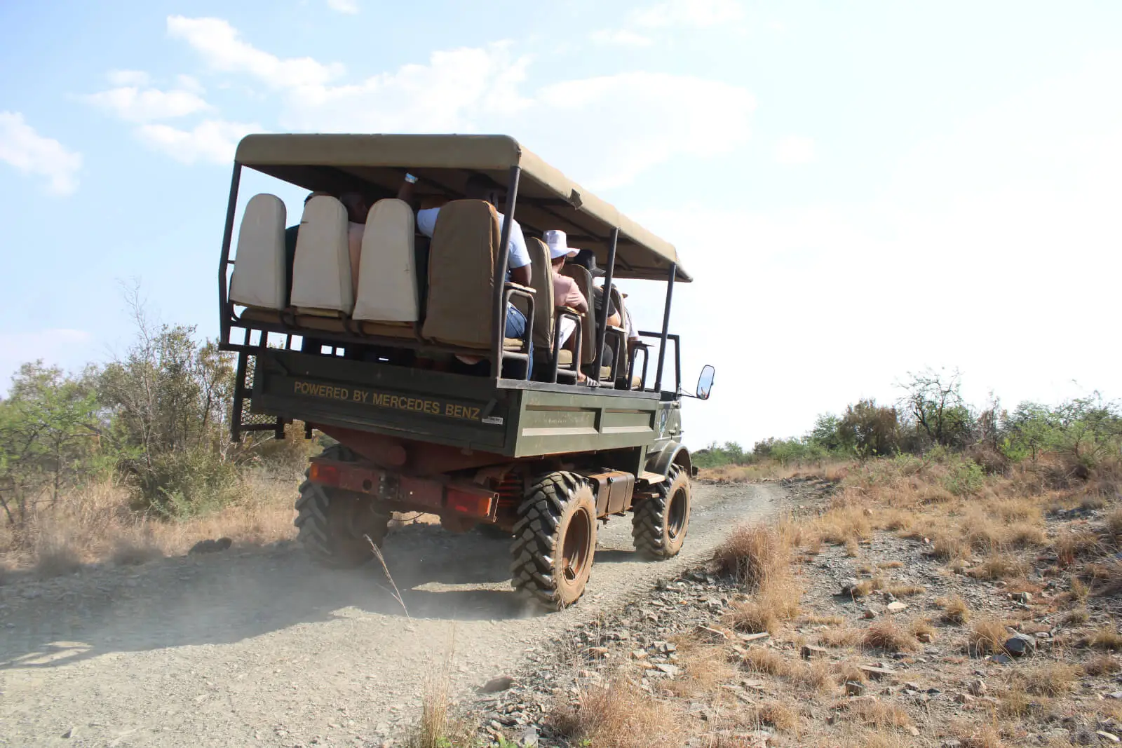 The Unimog climbing a track through the bush above the dam